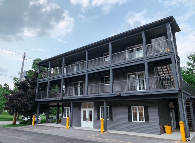 Photo of the Greystone Housing building from the parking lot.