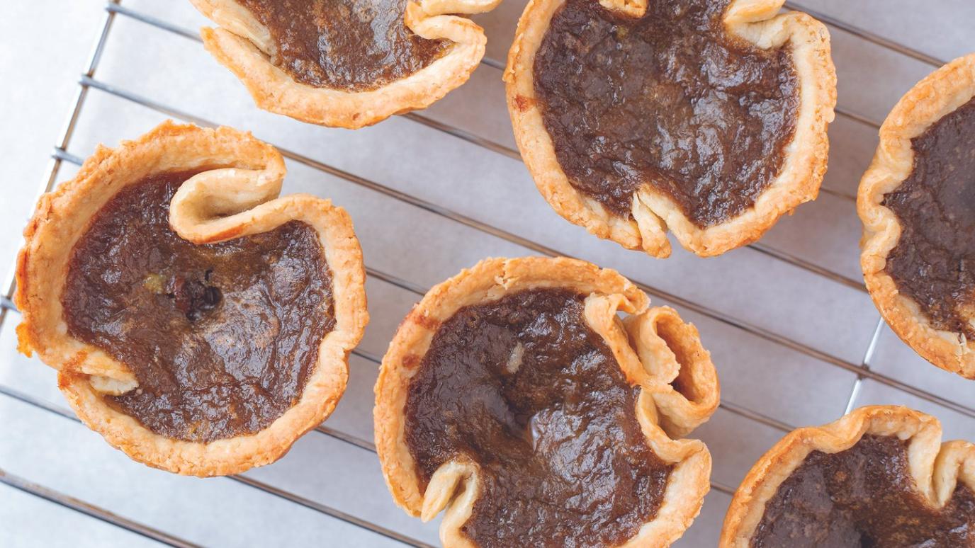 Butter tarts cooling on a wire rack