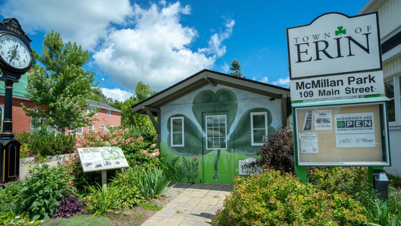 Clock and gardens in downtown Erin