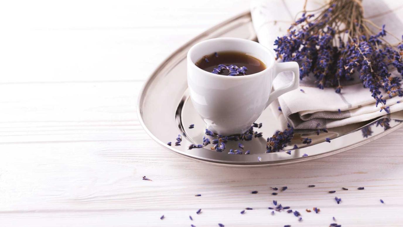 white coffee mug with dried lavender buds