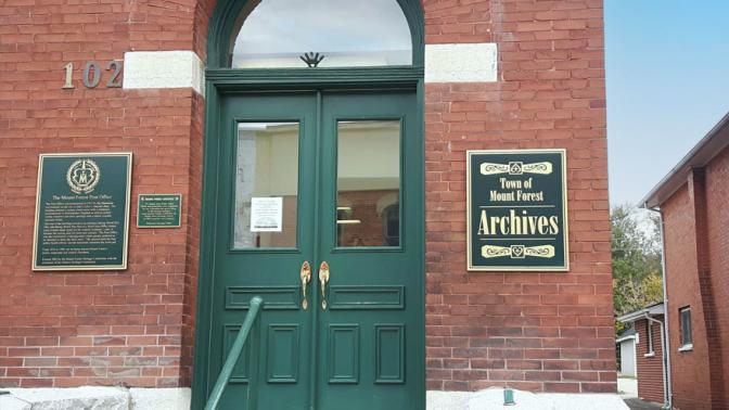Mount Forest Museum red brick heritage building with green entry doors