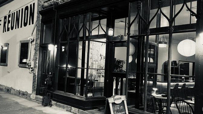 A photo of the frontage of Bistro Reunion in Black and White.