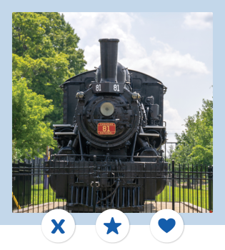 Mock dating profile image featuring a black train surrounded by green trees and blue skies. Three icons appear at the bottom of the image, next to a light blue border.