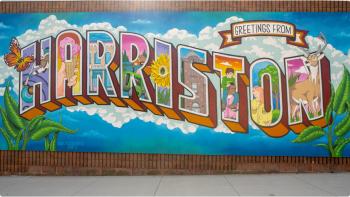 A colourful mural features the word "Harriston" with a colourful scene depicted in each letter.