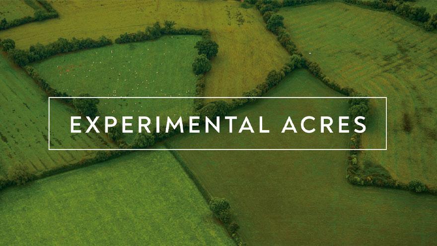 Experimental Acres written over top of an aerial view of fields