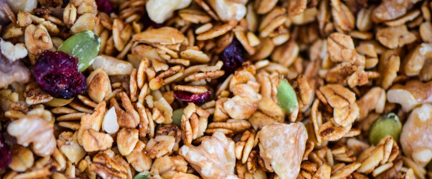 close up of granola with dried cranberries and pumpkin seeds